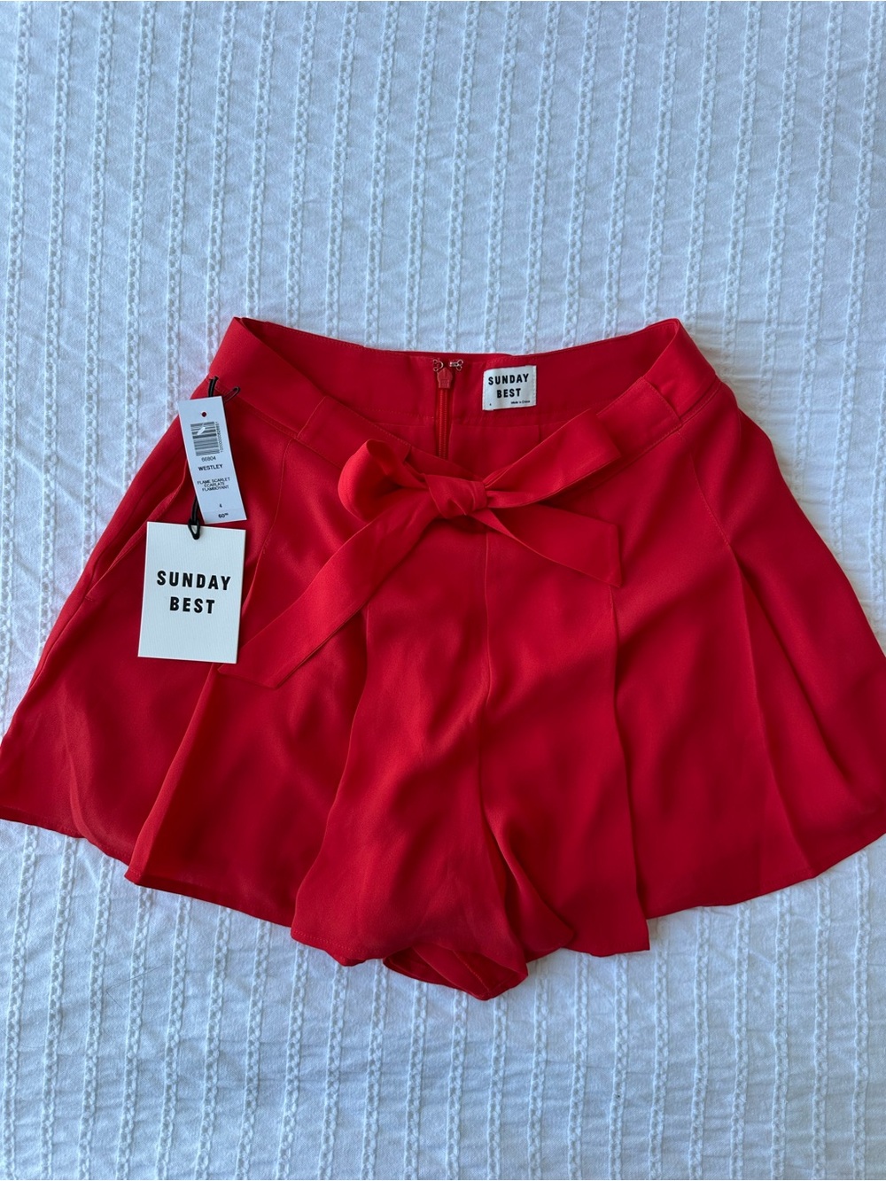 Aritzia: Red Bow Flowy Shorts